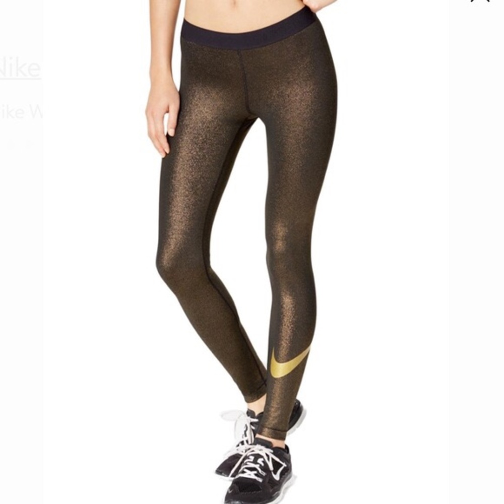 Nike Dri-Fit Gold Swoosh Sparkly leggings.